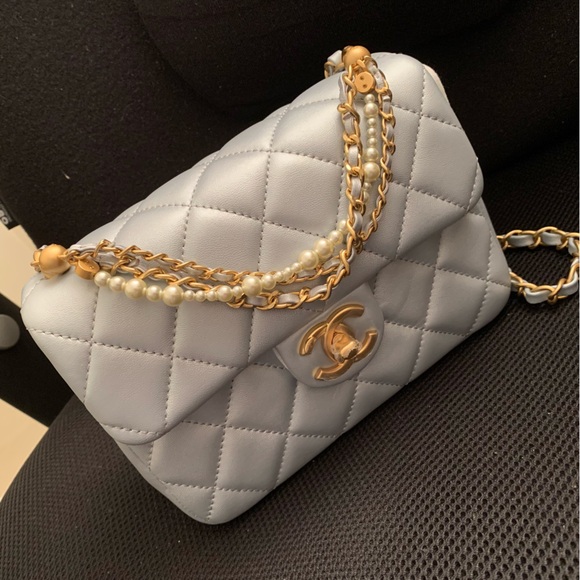 CHANEL Handbags - 24P mini flap bag style pearly blue with light gold pearls chain 💙🤍